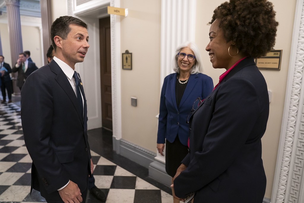 Pete Buttigieg speaking with leaders inside the White House